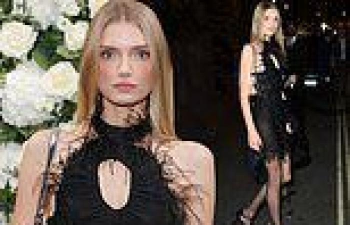 Victoria's Secret star Lily Donaldson flaunts her supermodel stature in a black ...