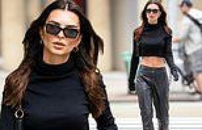 Emily Ratajkowski flaunts her flat abs in a crop top and leather pants