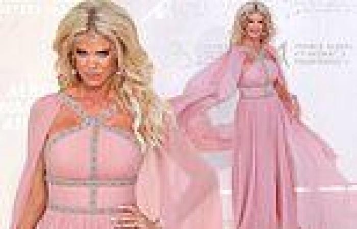 Victoria Silvstedt looks pretty in pink as she wows in a princess-style ball ...