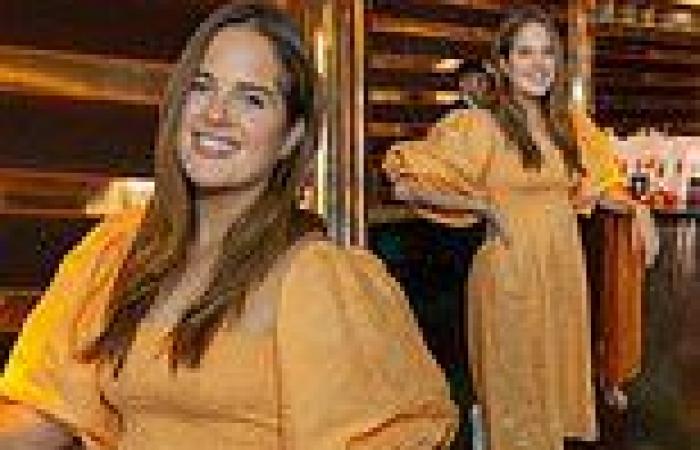 Binky Felstead wows in a bright yellow puff-sleeved dress as she attends a ...