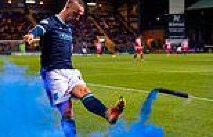sport news Dundee forward Leigh Griffiths apologises after kicking smoke bomb into the ...