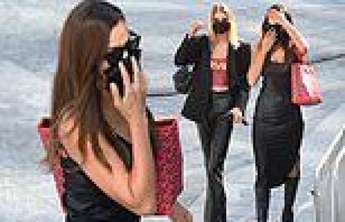 Irina Shayk flaunts her curves in a silk slip as she steps out at MFW with ...