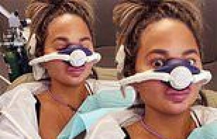 Chrissy Teigen gets silly as she appears to receive laughing gas at dentist