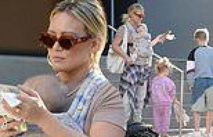 Hilary Duff is every inch the hands-on mom as she carries five-month-old Mae in ...