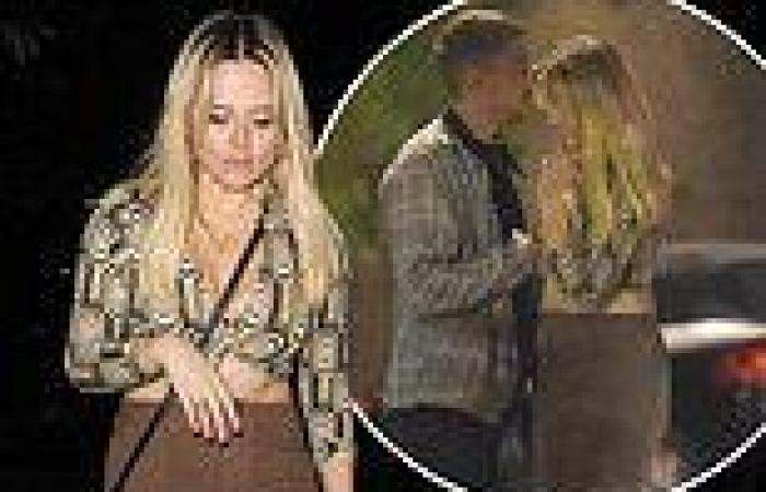 Emily Atack cosies up to her male pal as she hits the pub with her friends in ...