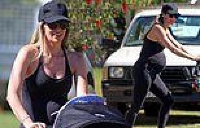 Pregnant Jennifer Hawkins, 37, shows off her blossoming baby bump in tight ...