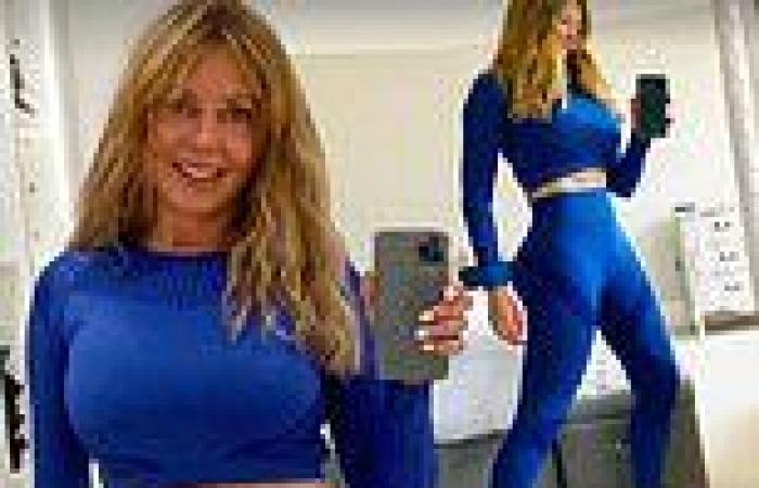 Carol Vorderman flaunts her taut stomach in gym wear as she immerses herself in ...
