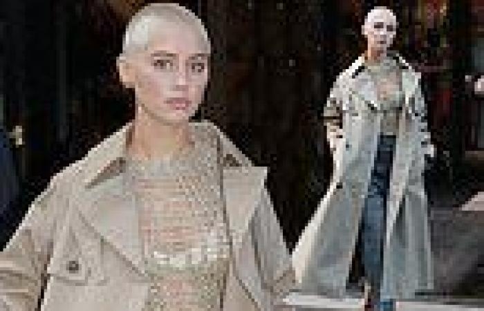 Iris Law cuts a stylish figure in Dior trench coat during Paris Fashion Week