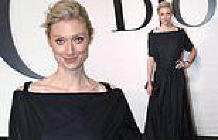 The Crown's Elizabeth Debicki stuns in an edgy oversized black gown at Paris ...