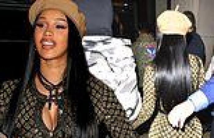 Cardi B showcases her curves in skintight jumpsuit as she attends fashion ...