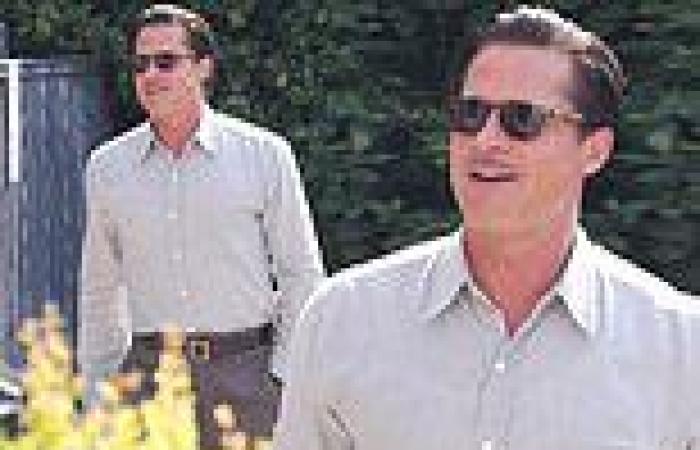 Brad Pitt looks dapper with a pencil mustache as he films new motion picture ...