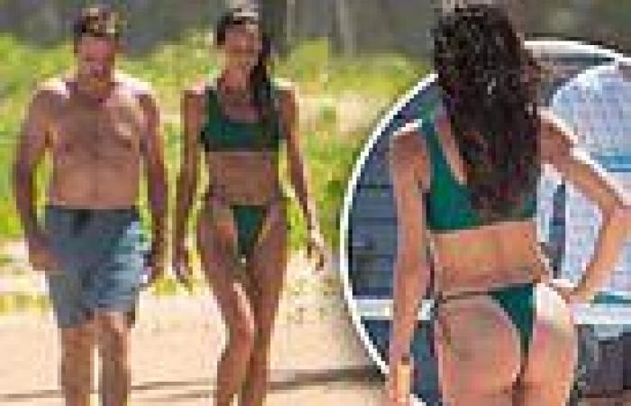 Gerard Butler shows off his toned torso with on-again girlfriend Morgan Brown ...