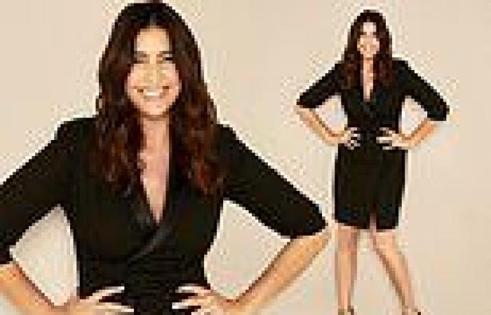 Lisa Snowdon wows in a plunging black tuxedo dress as she works her best angles ...