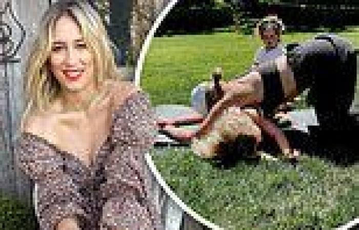 Phoebe Burgess shows off her 'summer bod' in activewear while being distracted ...