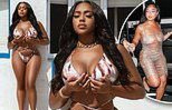 Jordyn Woods  shows off her toned body in a barely-there string bikini