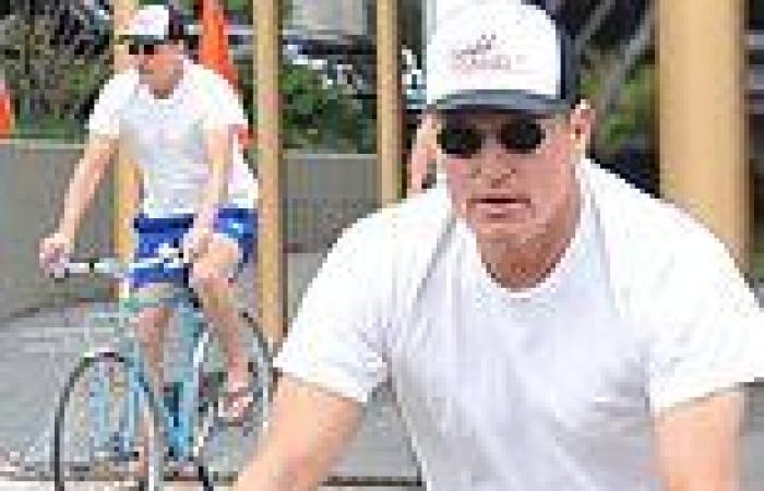 Woody Harrelson rides bikes around Washington D.C. after reportedly 'punching a ...