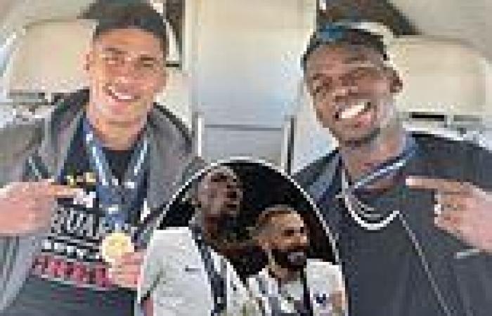 sport news Man United pair Paul Pogba and Raphael Varane pose with their Nations League ...