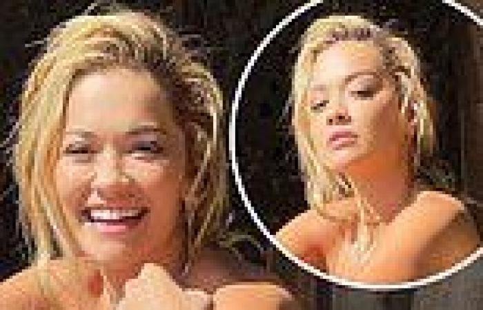 Rita Ora poses TOPLESS and dons nothing but a pair of hybrid legging boots in ...