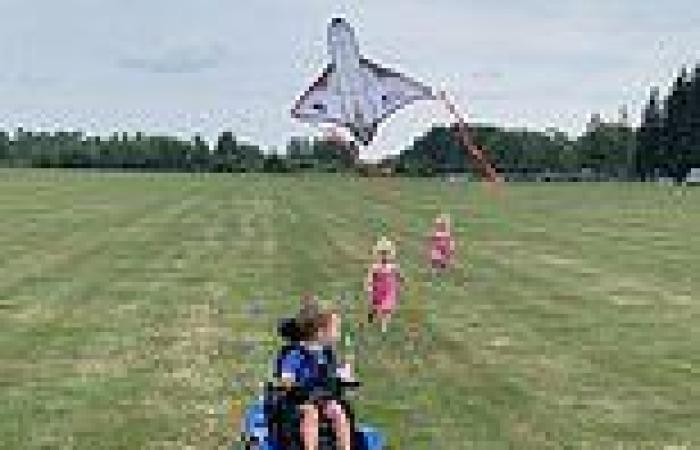 Heartwarming moment three-year-old boy in a wheelchair flies a kite for the ...