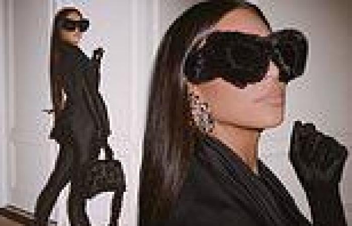 Kim Kardashian stuns in an edgy all-black ensemble complete with gloves and ...
