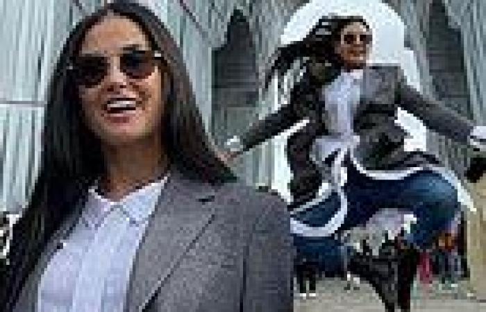 Demi Moore joyfully jumps into the air during 'photoshoot' in front of L'Arc de ...