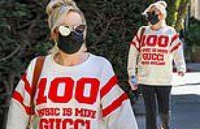 Rebel Wilson rocks a sporty red and white Gucci sweatshirt as she strolls ...