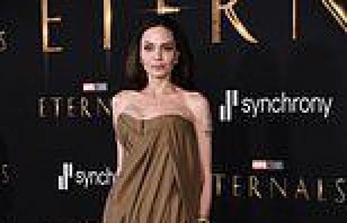 Angelina Jolie puts on an elegant display in billowing beige gown at Eternals ...