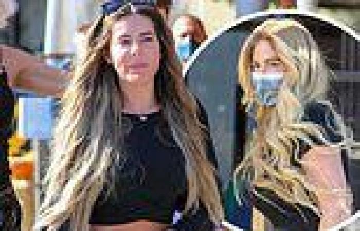 Brielle Biermann flashes her abs in black crop top during lunch date with mom ...