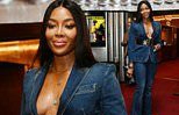 Naomi Campbell goes braless in a plunging double denim suit at Bob Marley The ...