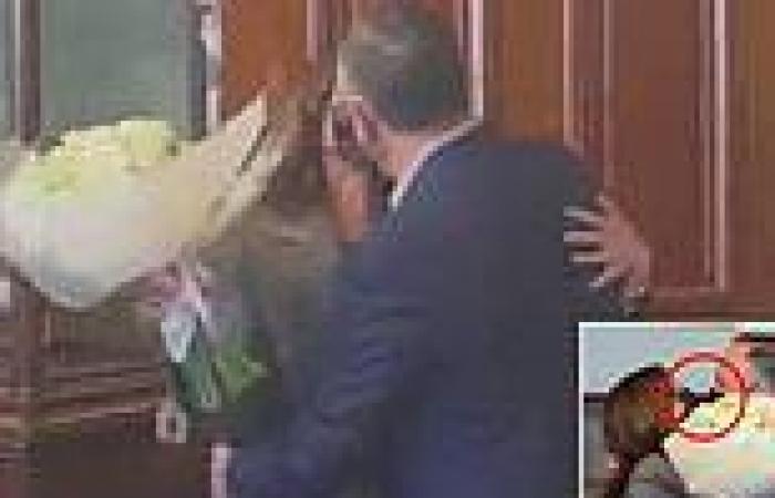 Harris kisses husband Doug Emhoff with their masks ON at birthday party where ...