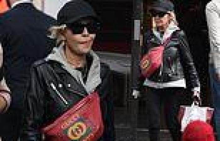 Lulu looks looks effortlessly cool in a biker jacket and red Gucci bag while ...