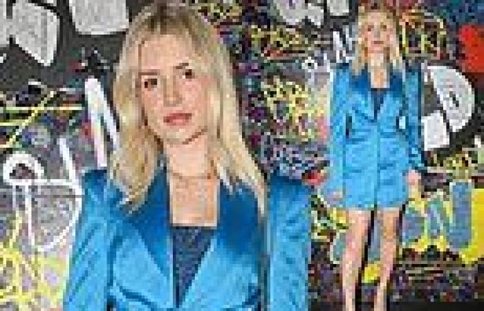 Lottie Moss puts on a leggy display in a thigh-skimming blue tuxedo dress