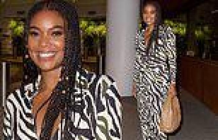 Gabrielle Union wows in plunging zebra printed dress for dinner in Beverly Hills