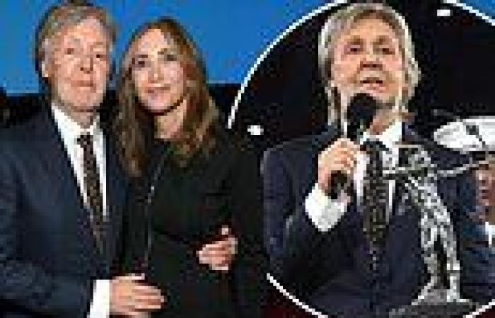 Sir Paul McCartney looks cosy as he stands arm-in-arm with wife Nancy Shevell ...