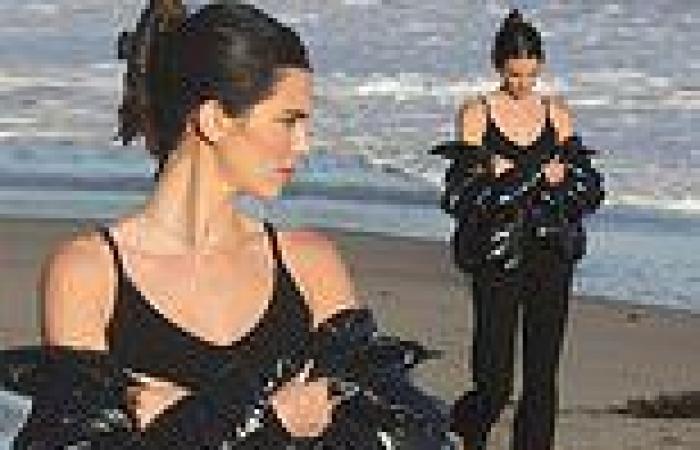 Kendall Jenner is a bombshell in black as she lets jacket slide tantalizingly ...