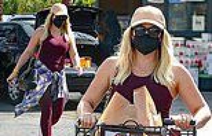 Hilary Duff makes a splash in burgundy workout gear as she steps out for ...