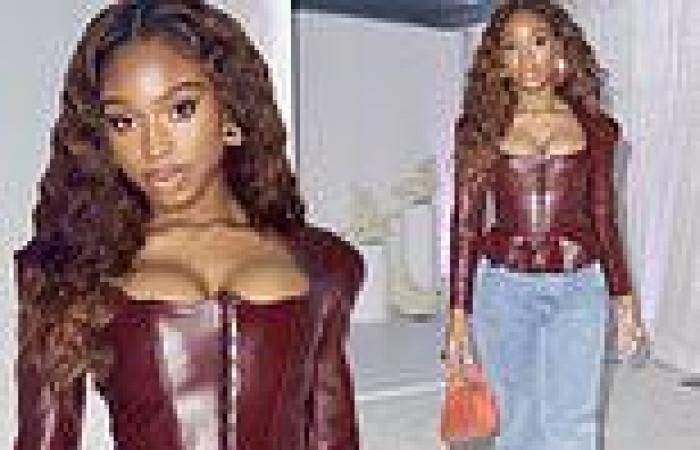 Normani flashes her ample assets in a burgundy leather corset at Lori Harvey's ...