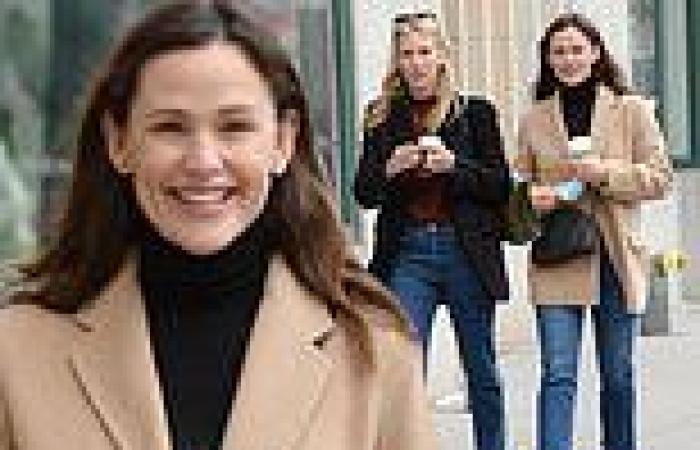 Jennifer Garner flashes a smile as she enjoys a brisk Fall stroll with a pal in ...
