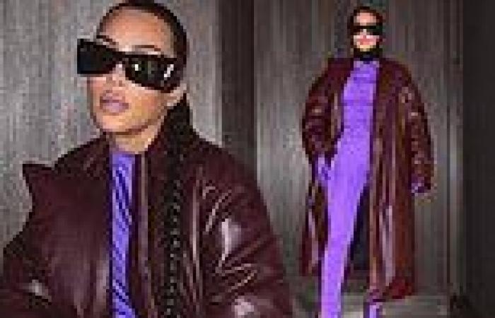 Kim Kardashian makes a statement in sexy skintight purple ensemble... days ...