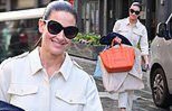 Kirsty Gallacher shows off her sartorial style in a cream boilersuit