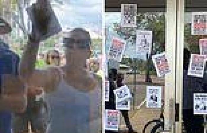 Anti-vaccine mandate protesters swarm ABC office in Darwin plastering the ...