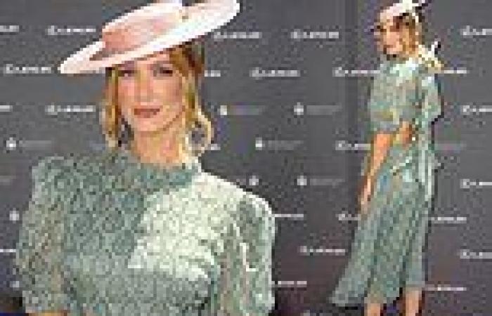 Delta Goodrem turns heads in an elegant green dress at Melbourne Cup event