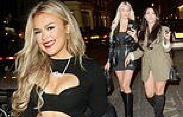 Tallia Storm turns up the heat in a cut-out black mini dress during a night out ...