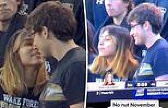 College football fan SNUBS his girlfriend's kiss on national TV, calls it an ...