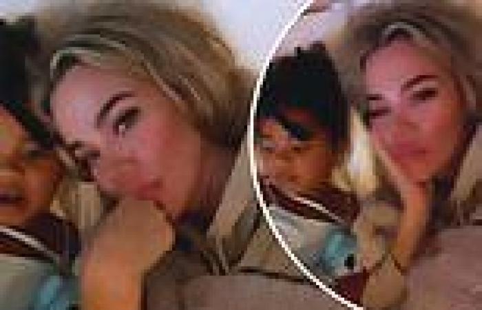Khloe Kardashian cuddles up to her daughter True, 3, in bed as they recover ...