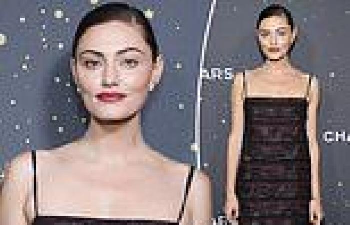 Phoebe Tonkin stuns in a fitted black frock as she attends Chanel party