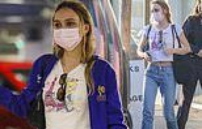 Lily-Rose Depp flashes midriff in a graphic tee while out shopping with a pal ...