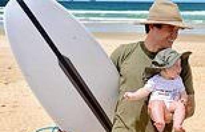 Bindi Irwin and Chandler Powell take their baby daughter Grace Warrior surfing