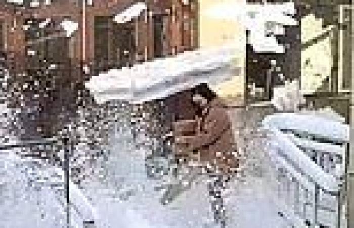 Scary moment huge slabs of snow thunder down on woman from roof in Hebei ...