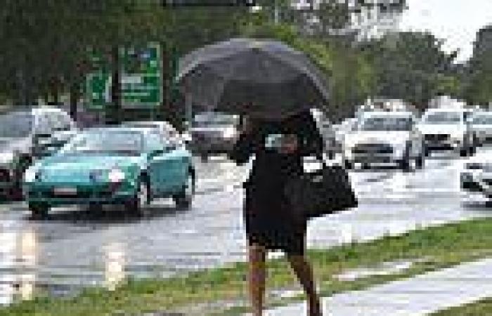 Australia battered by 340mm of rain with downpours sparking flash flooding
